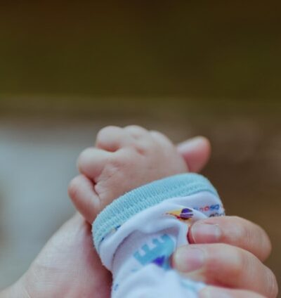 hand holding a baby hand